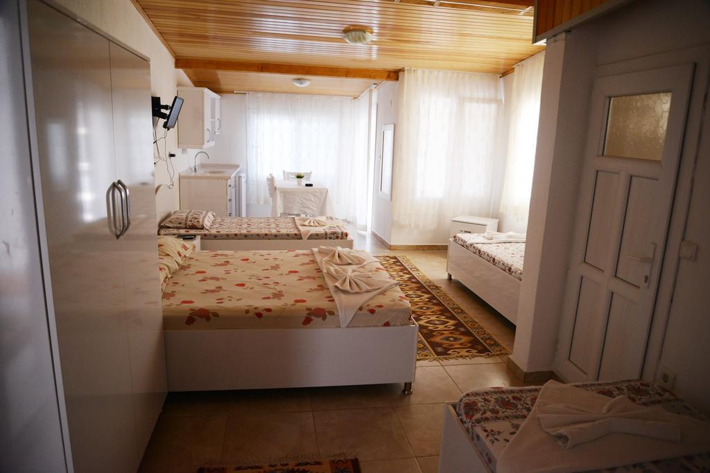 Huzur Hotel Siğacık Quarto foto